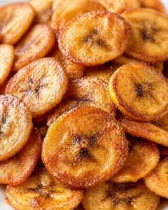 Final plated Cinnamon-Sugar Air Fryer Banana Chips served as a hero shot